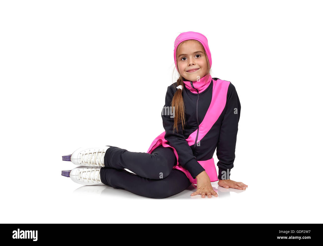 Kid girl in skates sitting on floor Banque D'Images
