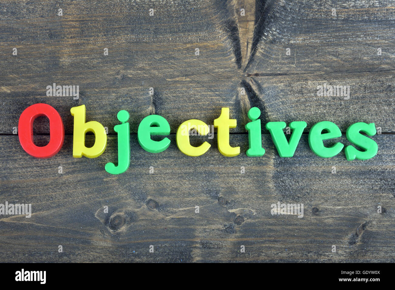 Objectifs mot sur table en bois Banque D'Images