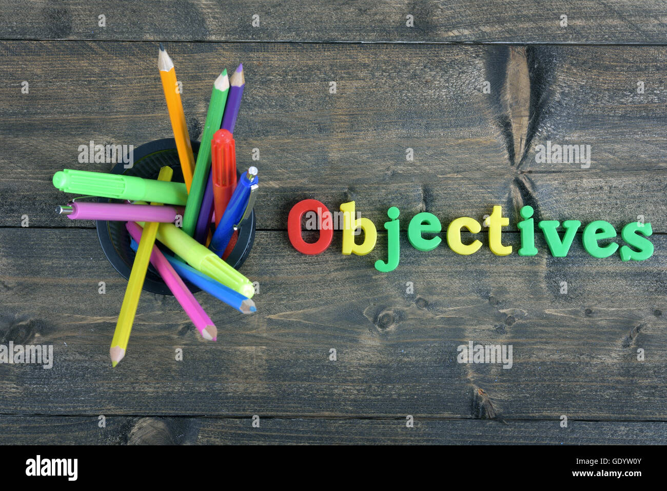 Objectifs mot sur table en bois Banque D'Images