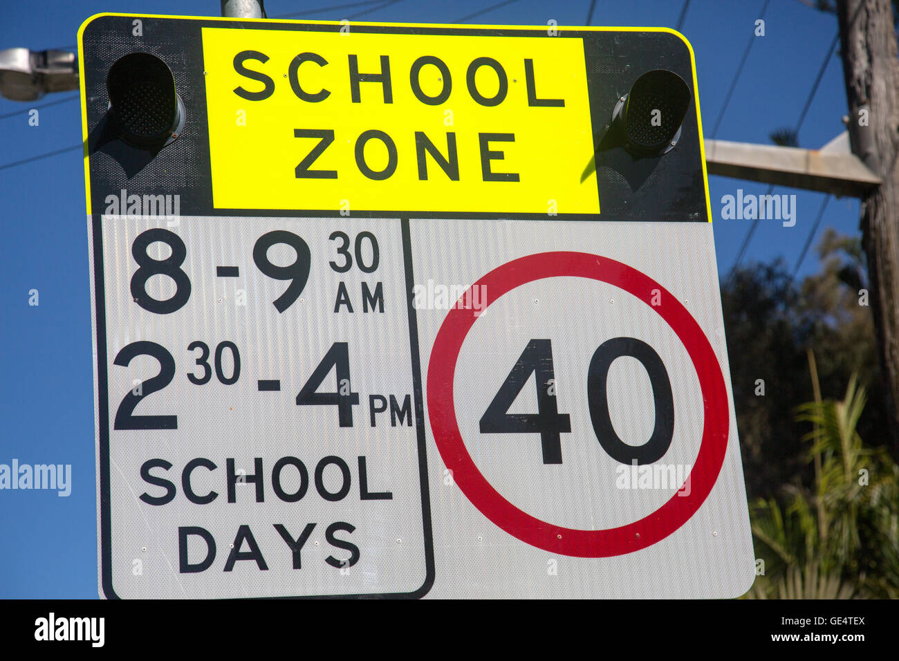 Signe de la limite de vitesse dans les zones scolaires à Sydney, Australie Banque D'Images