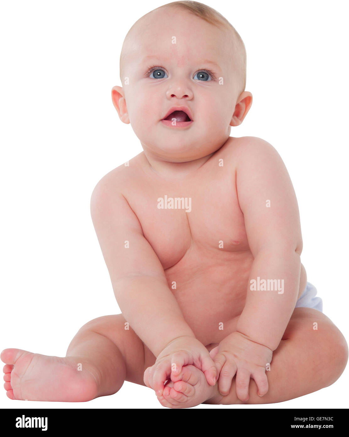 Une photo de bébé garçon torse nu Portrait of cute toddler Il est assis isolé sur fond blanc Banque D'Images