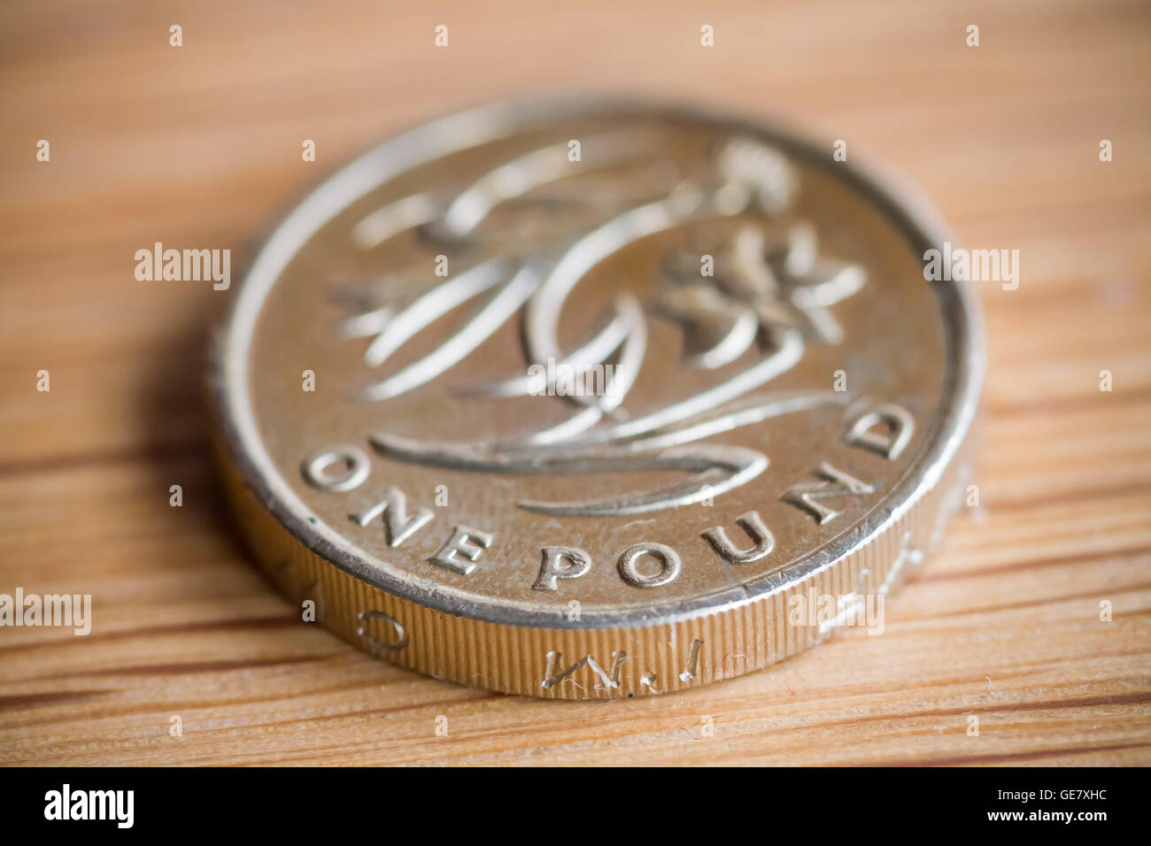 1 € la pièce de monnaie Livre sterling Banque D'Images