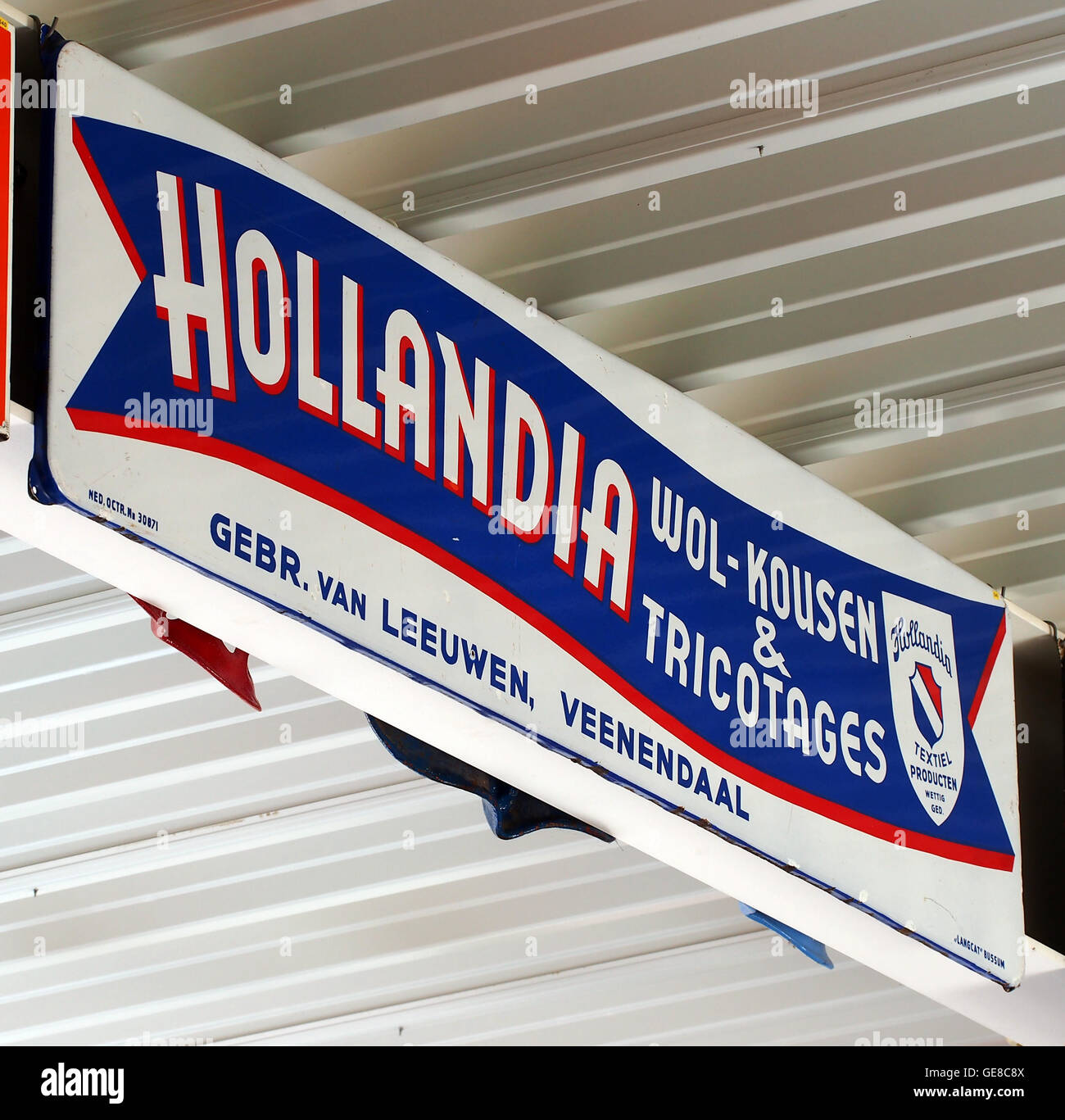 Hollandia, wol-kousen & reclamebord tricotages, Emaille Banque D'Images