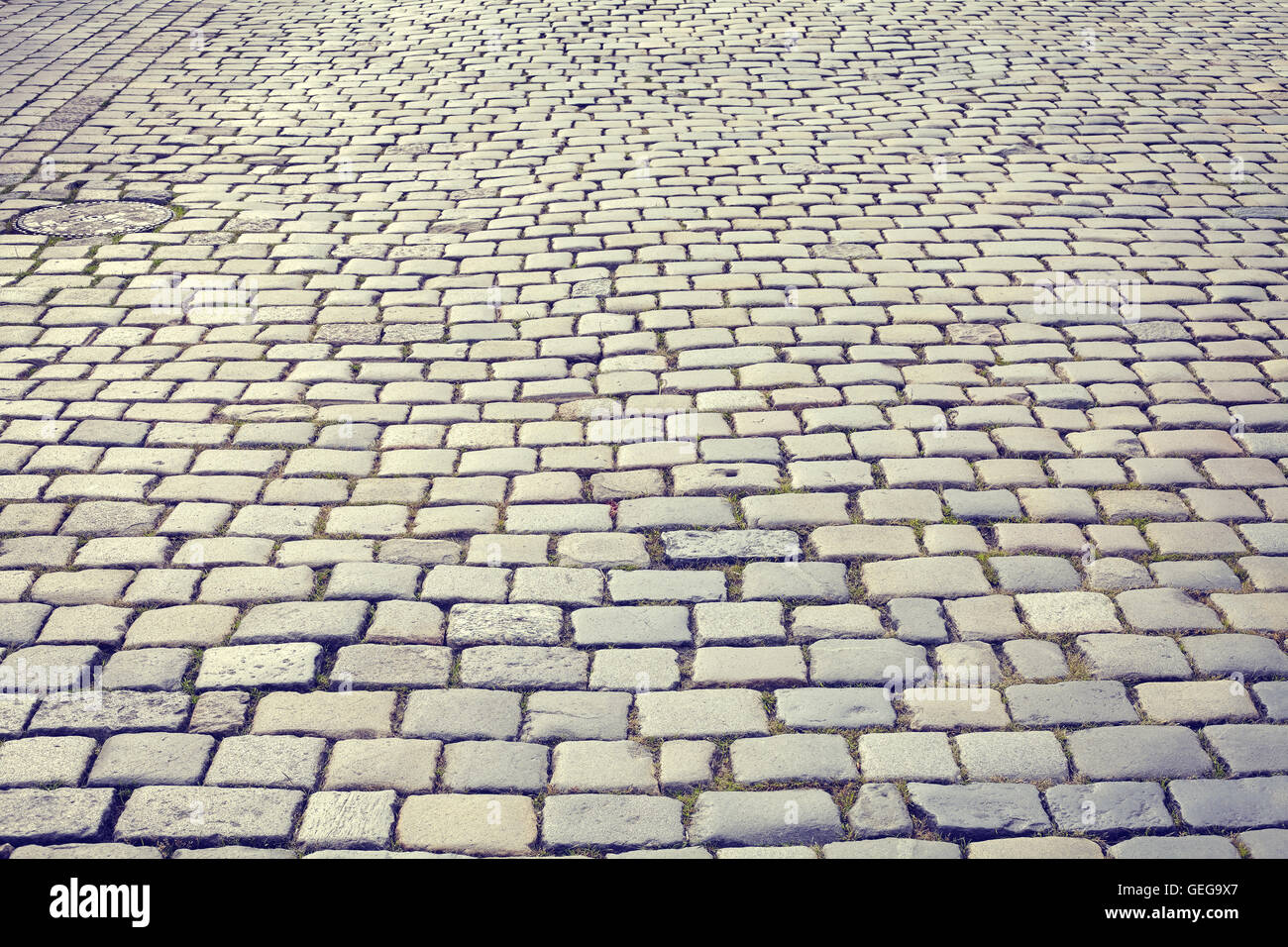 Tons Vintage rue pavée de Poznan, Pologne. Banque D'Images