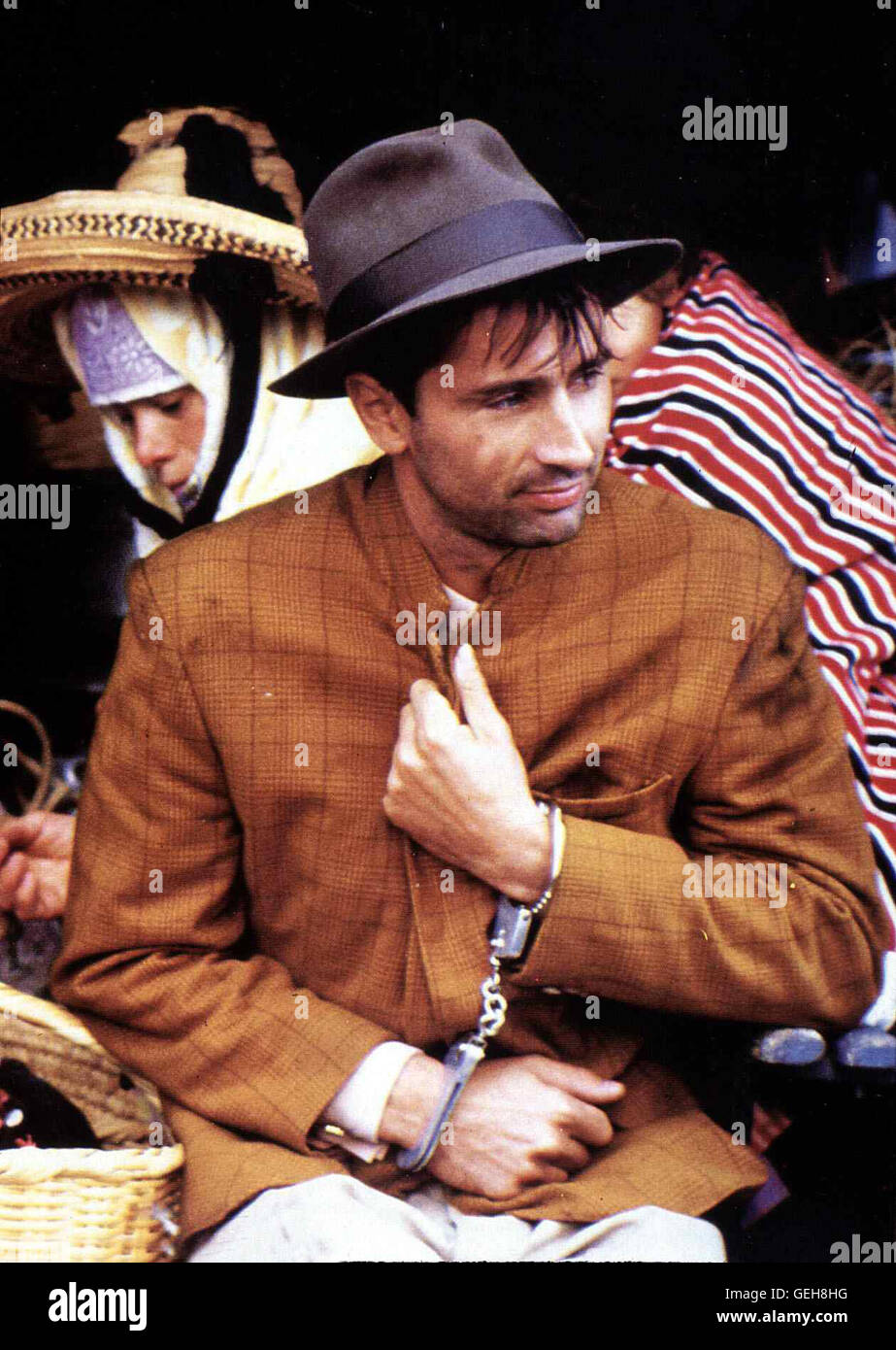 Thierry Lhermitte Die Polizei hält Richard (Thierry Lhermitte) für den möglichen Täter. *** *** Légende locale 1986, dernier ETE A Tanger, Letzter Sommer à Tanger Banque D'Images