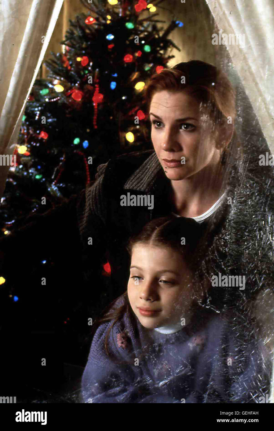 Michelle Trachtenberg, Melissa Gilbert Emma Murphy (Melissa Gilbert,r) kleine und ihre Tochter Noel (Michelle Trachtenberg) erleben kurz vor Weihnachten eine Ueberraschung ... *** *** 1996 légende locale, maison de vacances pour l'amour, A, Eingeschneite - Herzen Ein R Banque D'Images