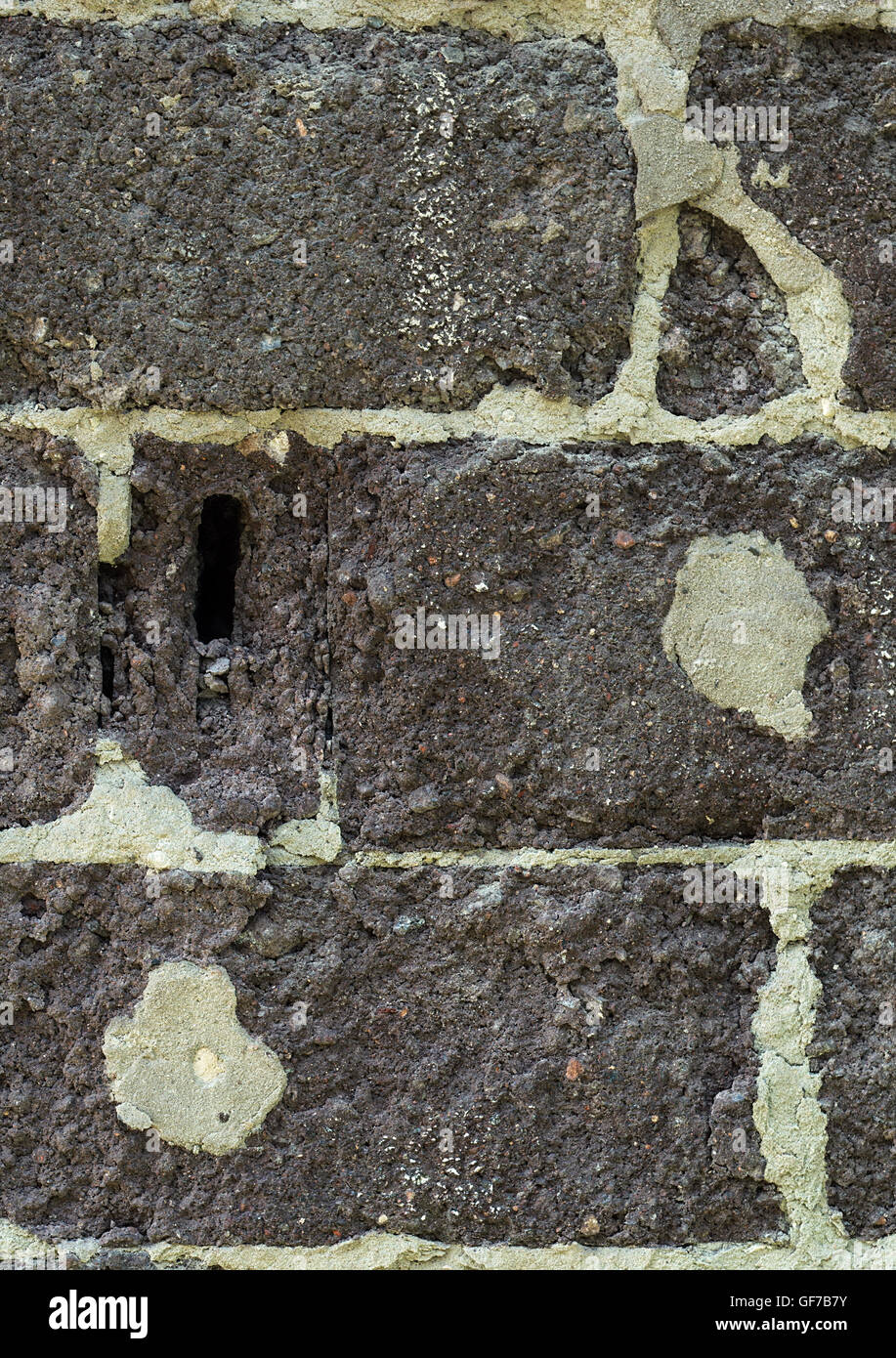 Une texture de vieux mur fait de blocs de béton Banque D'Images