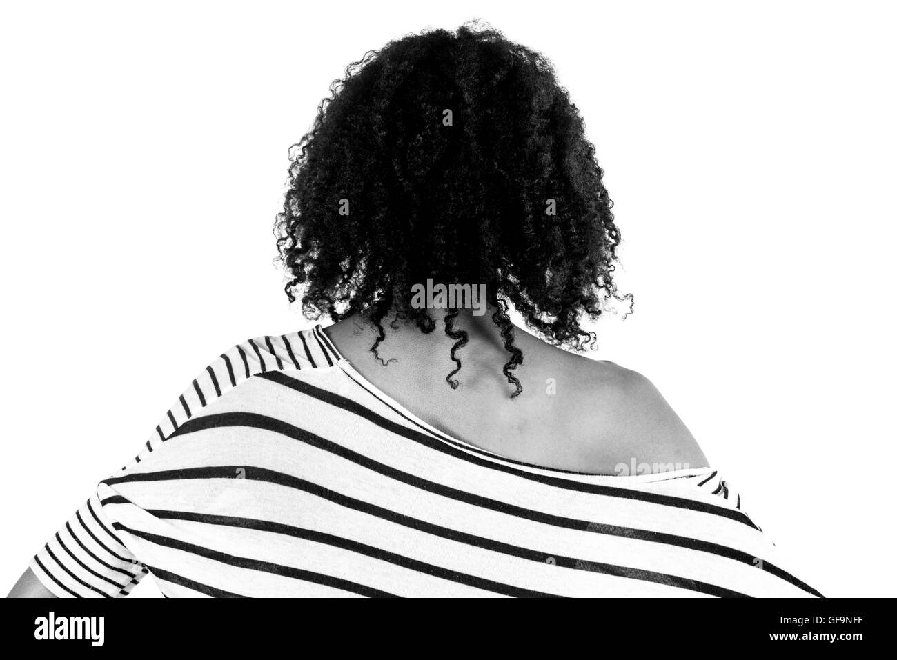 Modèle féminin jolie femme sur fond plein avec copie espace vue arrière behind back Banque D'Images