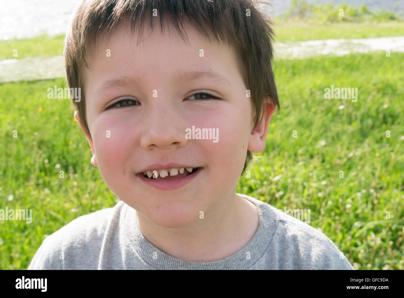 Close-up face kid boy smiling Banque D'Images