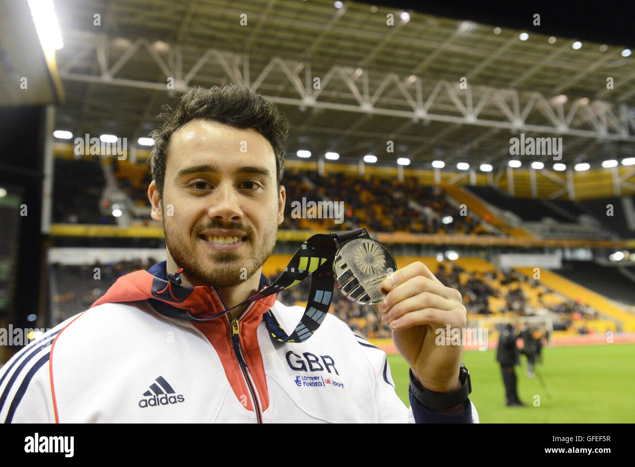 La gymnaste artistique Kristian Thomas avec sa médaille d'or aux Championnats du Monde Banque D'Images