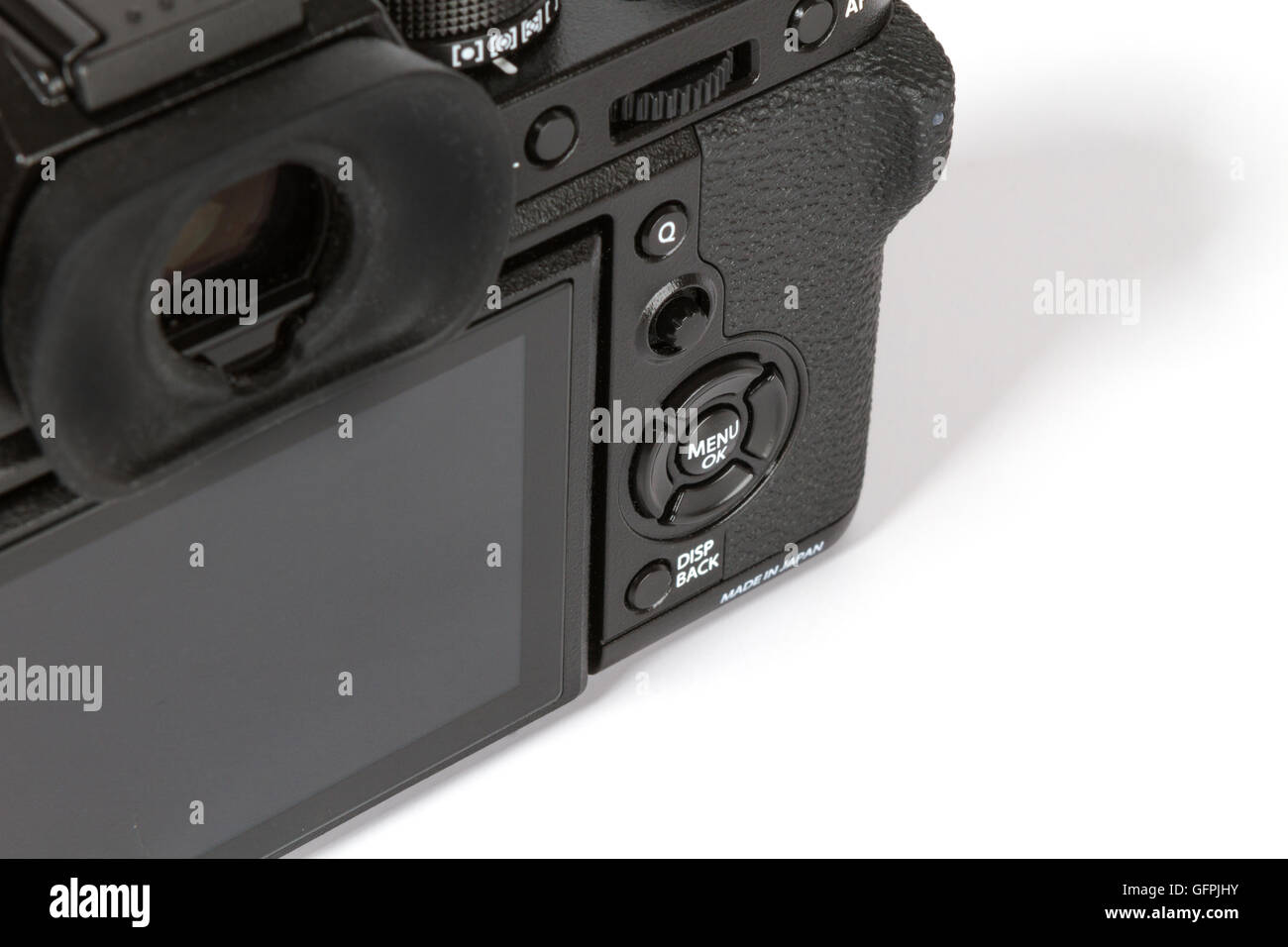 Photo de joystick par l'arrière, l'écran de détails FUJIFILM X-T2, 24 mégapixels, caméra vidéo 4K mirrorless sur fond blanc Banque D'Images