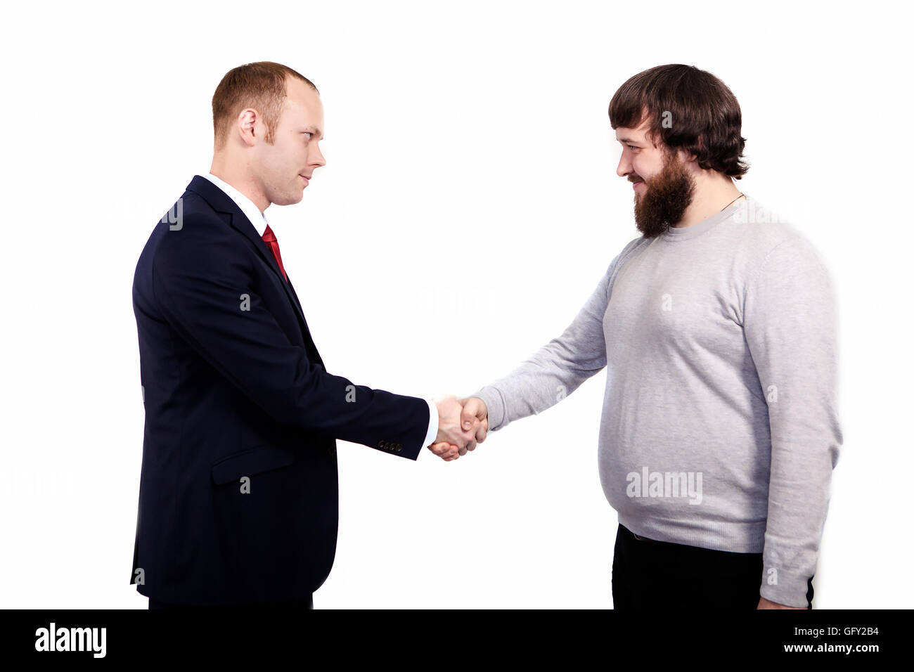 Réunion de partenariat d'affaires. Photo businessmans poignée de main. Établissement d'affaires prospères après une bonne affaire. À l'horizontal, fond blanc Banque D'Images