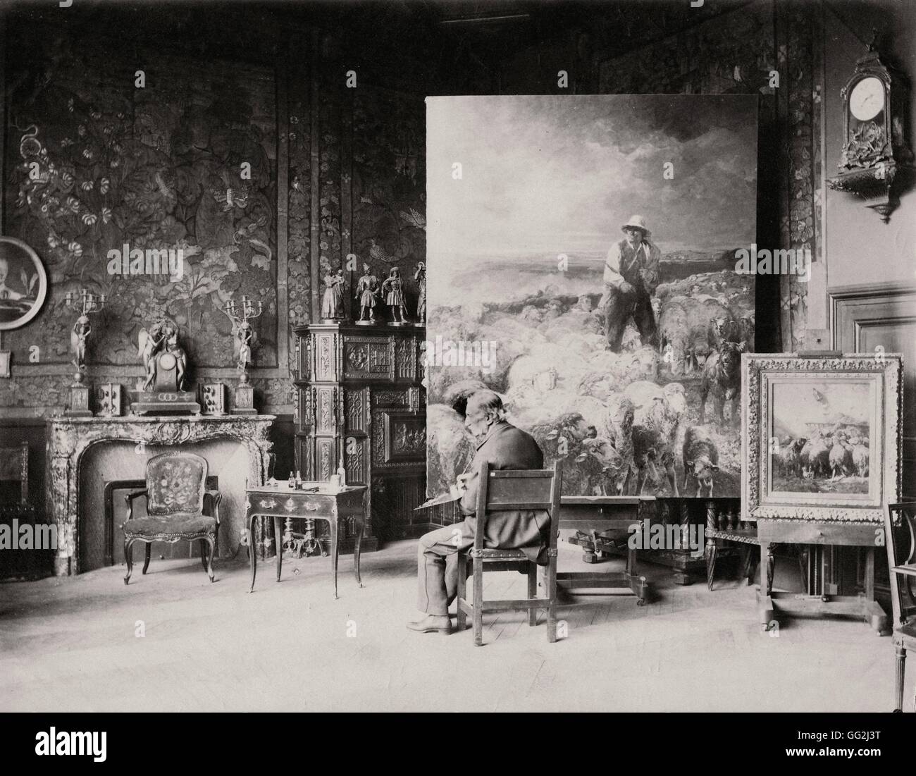 Peintre français Charles Jacque dans son studio situé à Paris 73 boulevard de clichy dans le 18e arrondissement de Paris. Photographie par Edmond Bénard c.1888. L'albumine. Banque D'Images