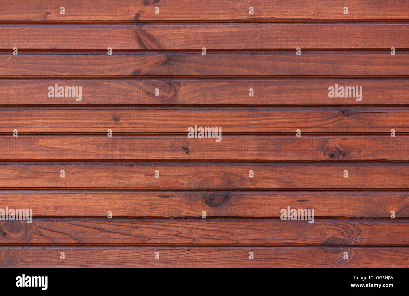 Mur en bois brun foncé fait de planches Banque D'Images