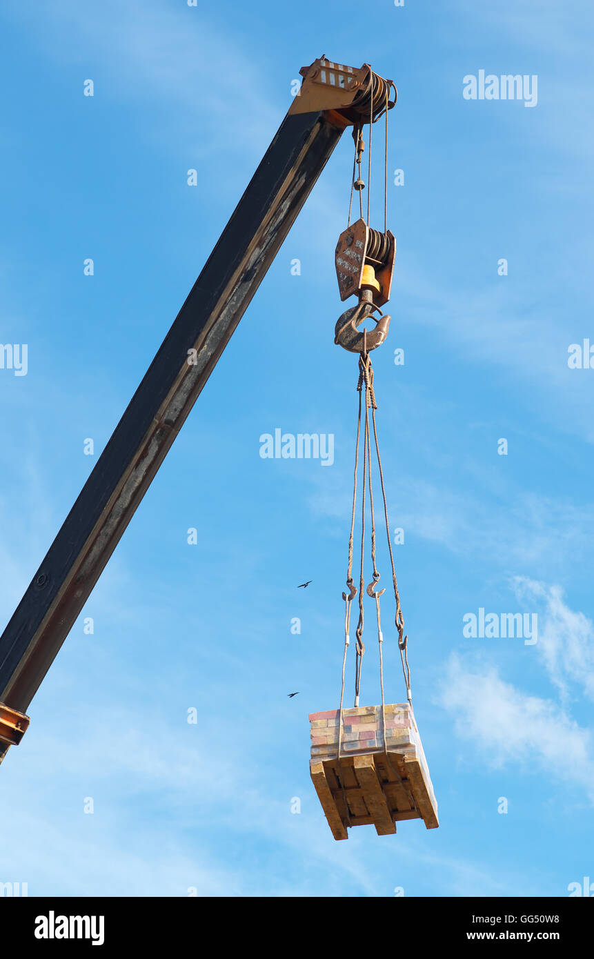 Grue et cargo. Élément de la conception des bâtiments. Banque D'Images