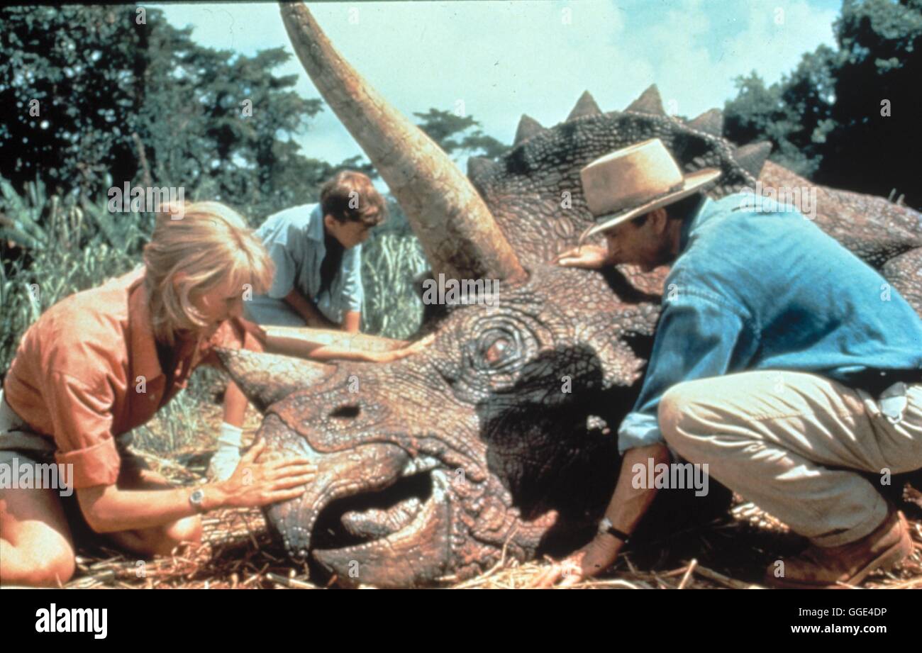 JURASSIC PARK Jurassic Park / USA 1993 / Steven Spielberg Dr Ellie Sattler (Laura Dern), Hammonds Enkel Tim (JOSEPH MAZELLO) und Dr. Alan Grant (Sam Neill) im 'Jurassic Park'. Regie : Steven Spielberg aka. Jurassic Park Banque D'Images