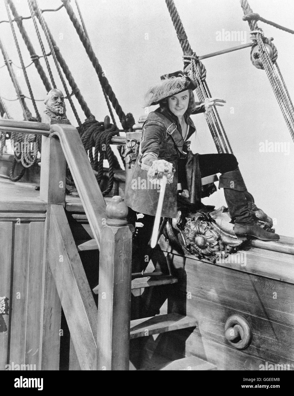 UNTER PIRATENFLAGGE / Capitaine Blood USA 1935 / Michael Curtiz englische junge Der Arzt Peter Blood wird im Jahre nach 1685 deportiert Westindien. Dort wird er als Sklave verkauft, weil er einem verletzten Rebellen gegen König Jakob II. geholfen hat. Es ihm gelingt mit einer Handvoll, entschlossener Gefährten zu entfliehen Kriegsschiff spanisches und ein zu kapern. Männer und seine sang fortan gelten als im Karibischen Freibeuter gefürchtete Meer, bis sie können beweisen, dass sie mehr sind als goldgierige Piraten. Foto : voir mit du Capitaine Blood (Errol Flynn) Régie : Michael Curtiz aka. Le Capitaine Banque D'Images