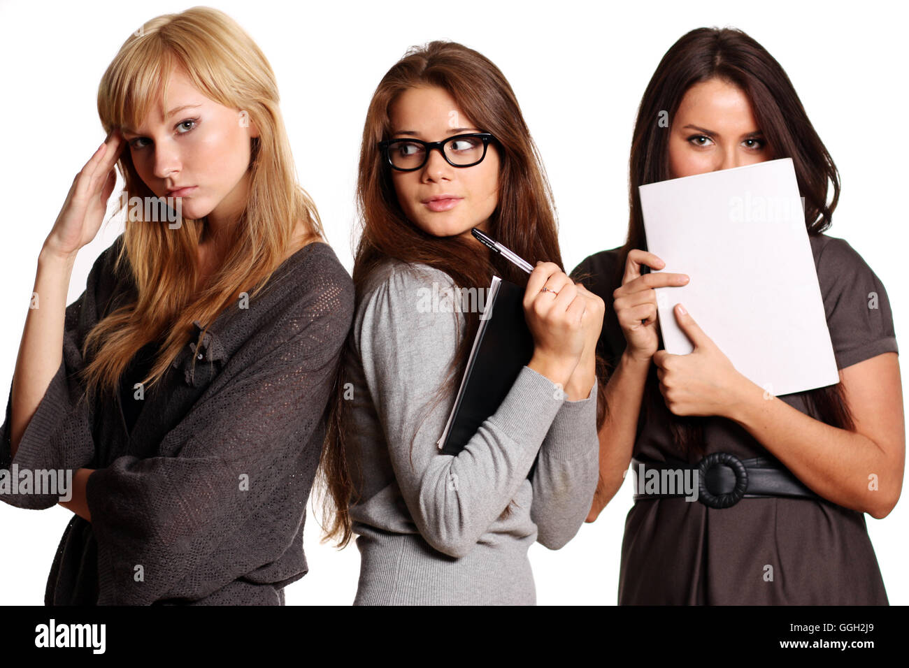 Les jeunes femmes reading book isolated on white Banque D'Images