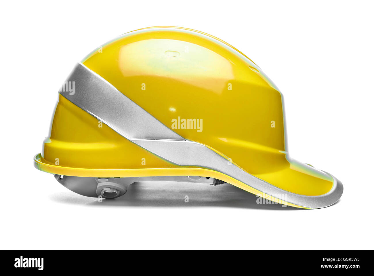 Casque de sécurité jaune sur fond blanc Banque D'Images