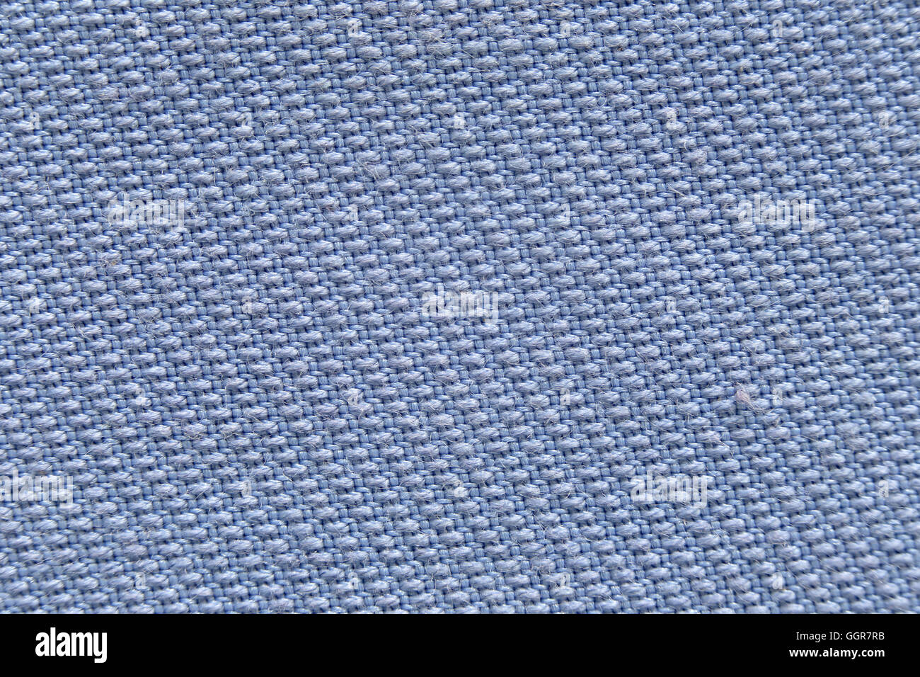 Surface de tissu bleu en tir super macro pour la conception Texture background. Banque D'Images