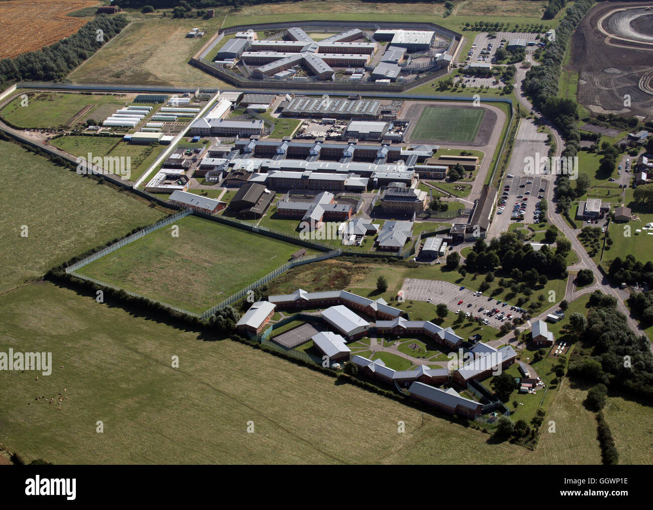 Vue aérienne de Rainsbrook Secure Training Centre, HMP Onley & HMP Rye Hill près de Rugby, Royaume-Uni Banque D'Images