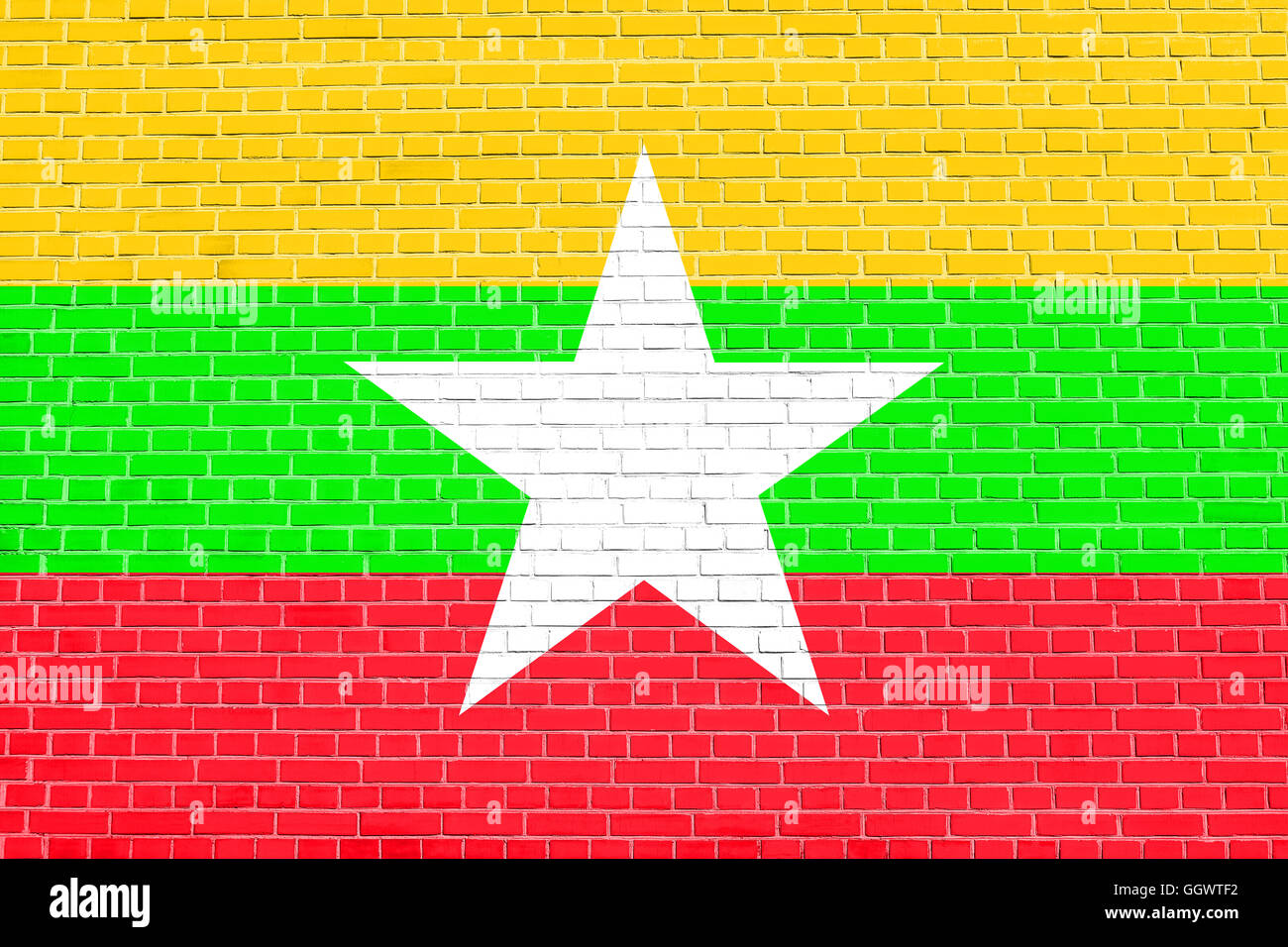 Pavillon du Myanmar sur mur de brique texture background. Drapeau national du Myanmar. Banque D'Images