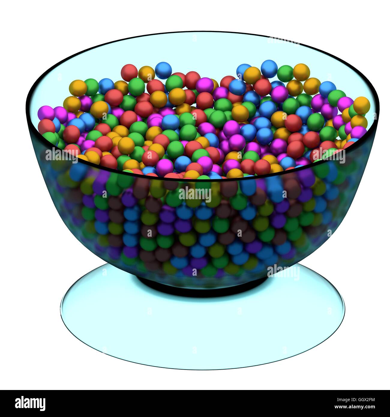 Bol en verre avec différentes sphères colorées Banque D'Images