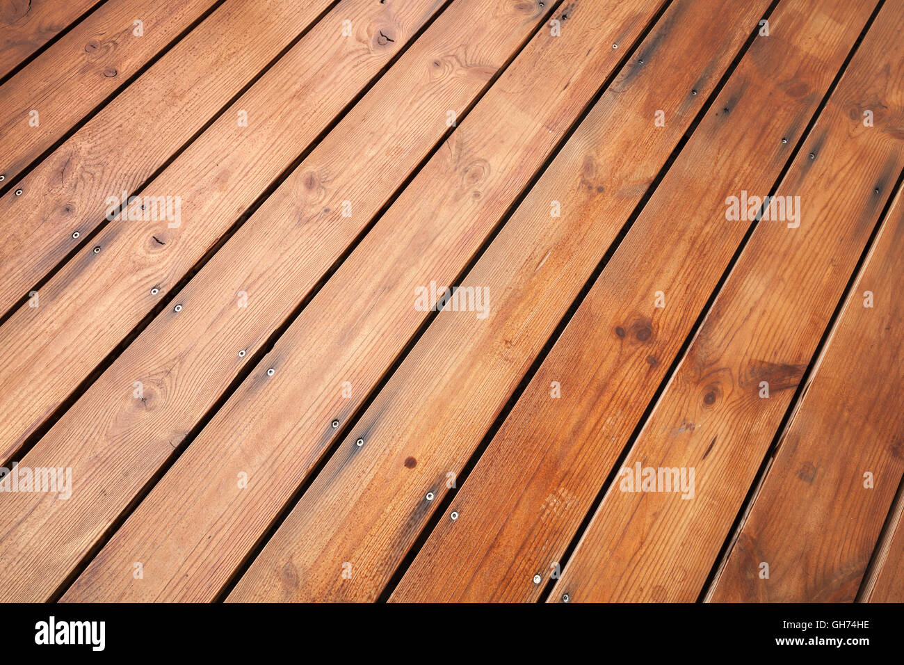 Plancher en bois rouge fond photo texture avec effet de perspective Banque D'Images
