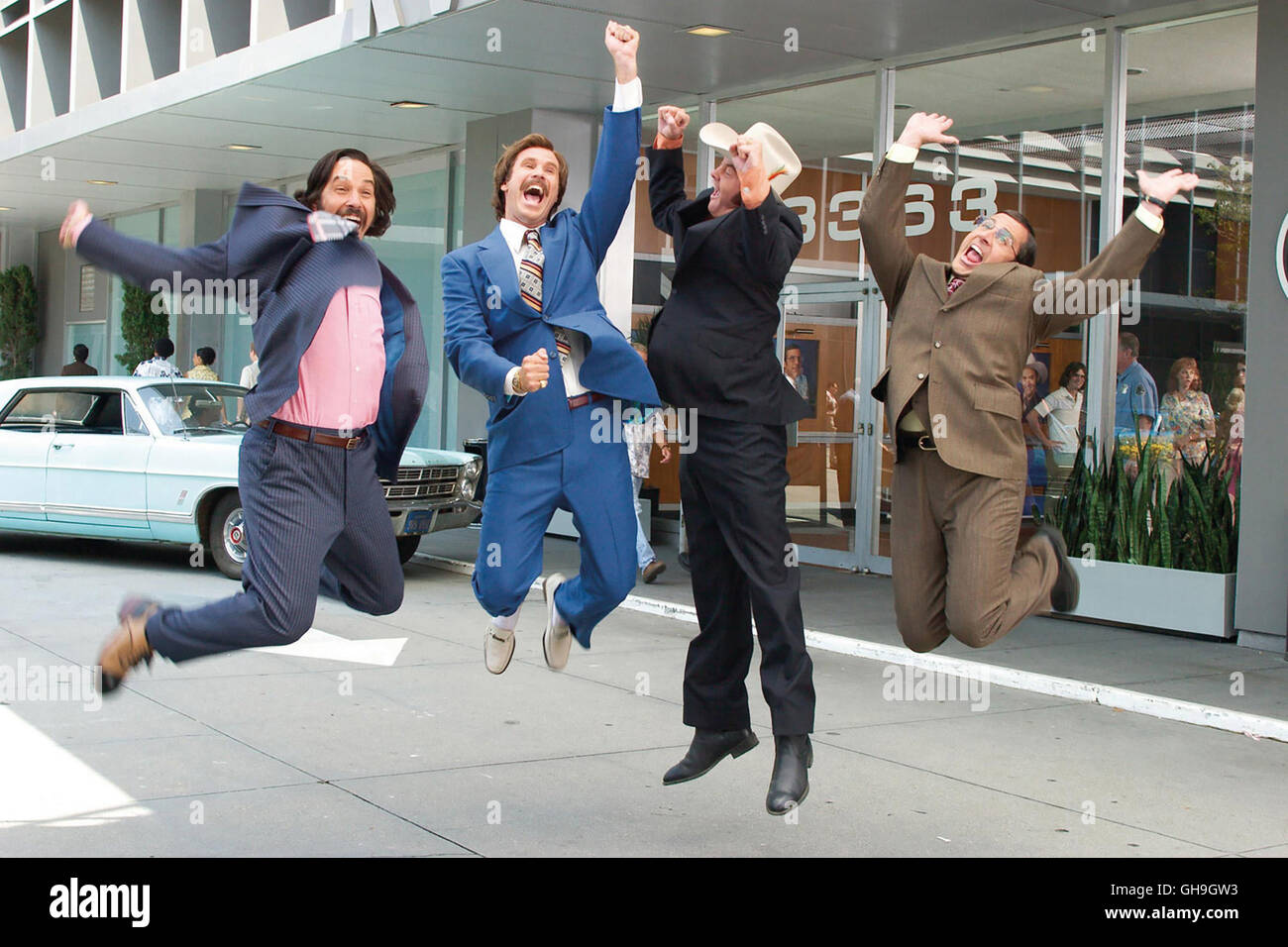 Brian Fantana (Paul Rudd), Ron Burgundy (Will Ferrell), le champ Type (David Koechner) et de briques Tamland (Steve Carell) célébrer la San Diego's top-rated news team. Film, Fernsehen, Kino, Comedy Comedy Regie : Adam McKay aka. Présentateur : la légende de Ron Burgundy Banque D'Images