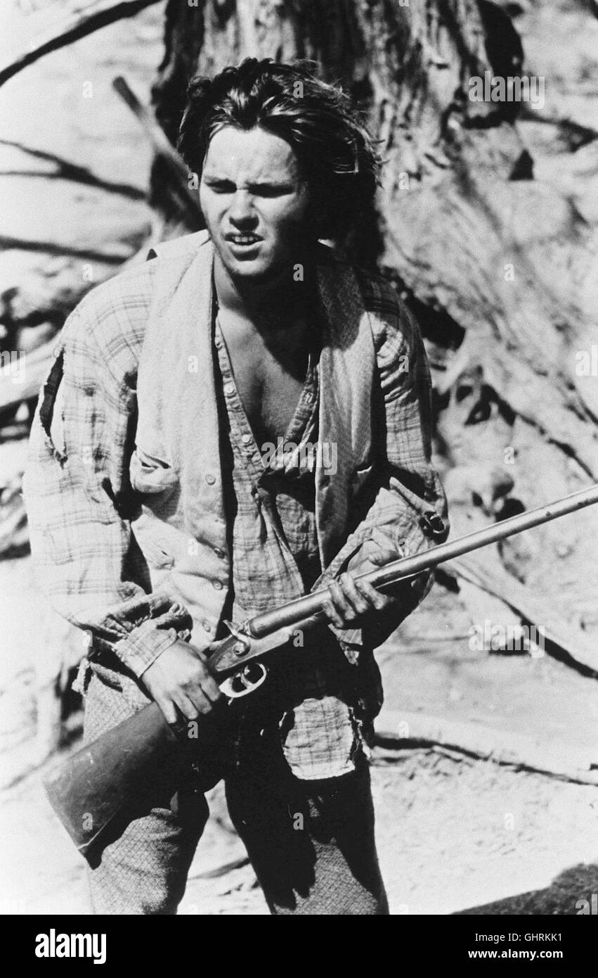 SCHWEIGENDE ZUNGE - DIE RACHE DER GEISTER - Mexique 1873. Talbot re (RIVER PHOENIX) halbindianische Frau ist im Kindbett Awbonnie gestorben. Während Talbot Tag und Nacht allein in der Prärie un in Ihrem Leichnam, wird er hält Totenwache verrückt vor Kummer. Awbonnie erscheint als ihm und Geist bittet Talbot darum, den Körper zu verbrennen, damit Sie Ihren Frieden finden kann. Talbot Doch nicht gehen lassen sie sera. Sein Vater Prescott sucht den Schausteller Eamon McCree auf. Bei ihm er einst. Awbonnie gegen drei Pferde getauscht. Nun ist er besessen von der Idee, dass nur Awbonnies Banque D'Images