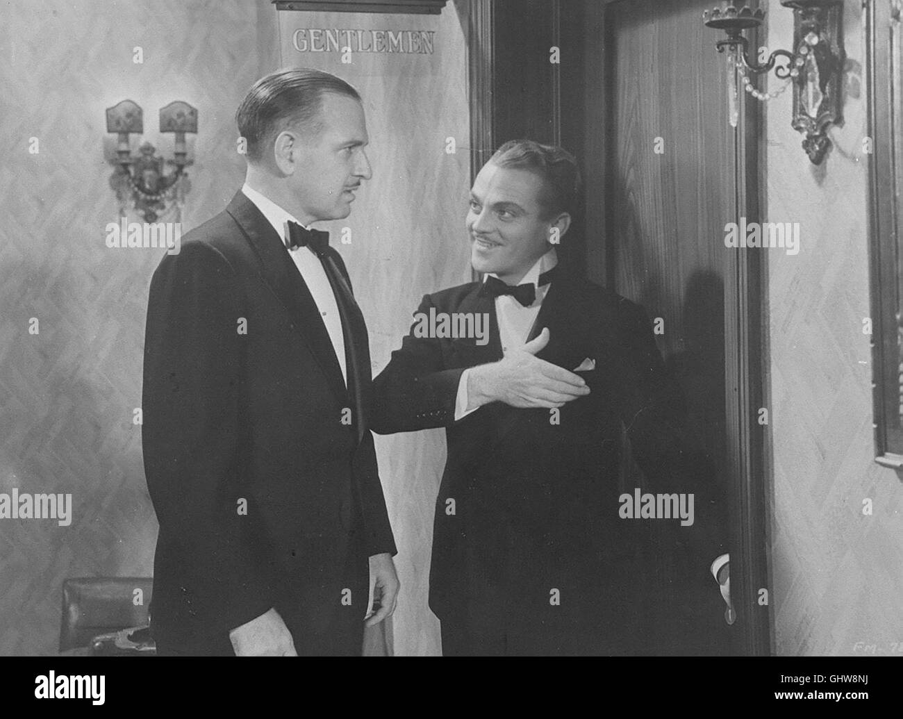 DER FRAUENHELD-0 Eine seltsame Karriere : Vom Platzanweiser in einem zum Kino und patron Einbrecherbande - Dan Quingley, glaubt es geschafft zu haben. Doch dann wendet sich sein le destin. Als er wird von der Polizei verhaftet, macht sich seine Geliebte Myra aus dem Staub und nimmt sein Geld auch gleich mit. Als er freigelassen wird er irrt, mittellos durch die Straßen von Los Angeles - bis nhi ein Filmteam entdeckt und er Ein zweites Mal Karriere macht ... Foto : voir mit Dan (James Cagney). Regie : Roy del Ruth aka. Lady Killer Banque D'Images