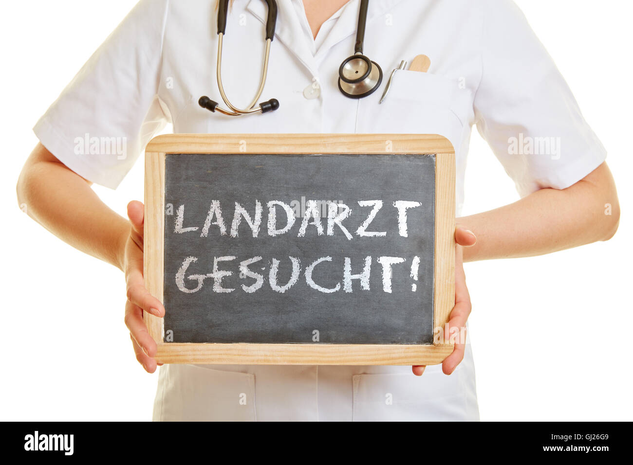 Doctor holding un tableau noir avec le mot allemand 'Landarzt gesucht !' (médecin de campagne) Banque D'Images