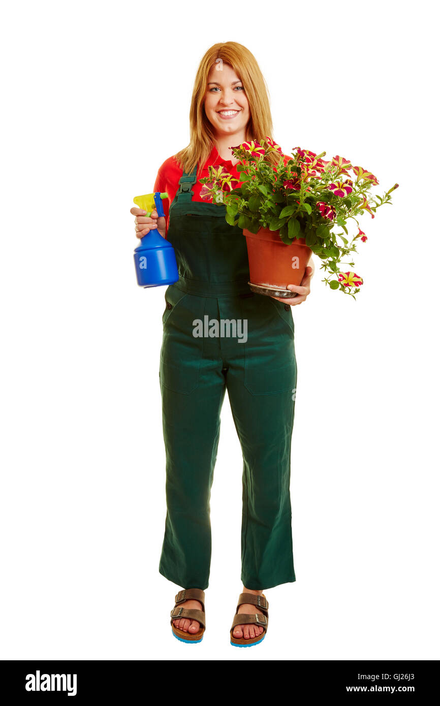 La femme comme un fleuriste avec des fleurs sur ses mains Banque D'Images