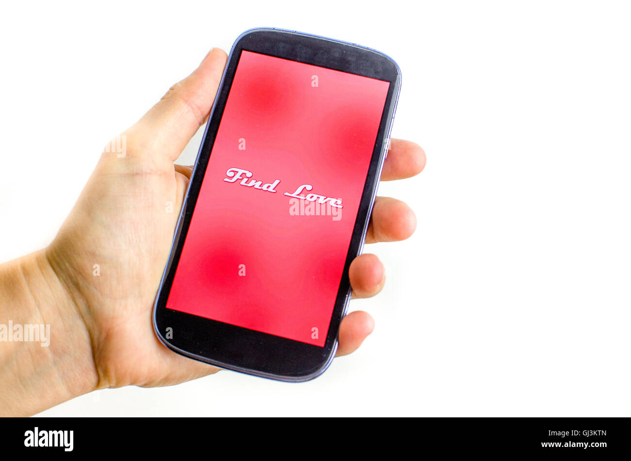 Trouver l'amour main smartphone Banque D'Images
