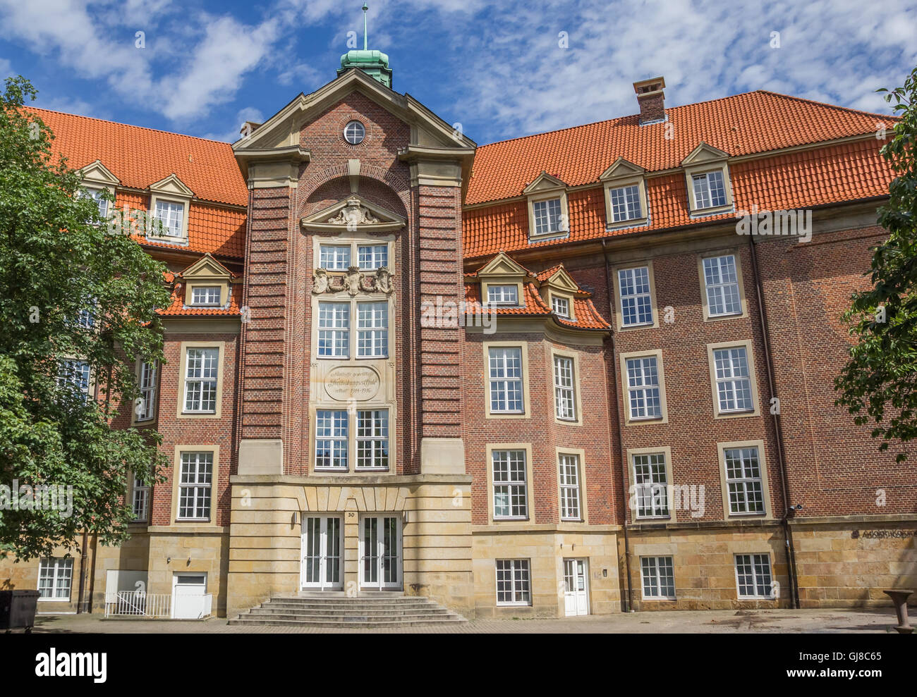 Bâtiment de l'école historique dans le centre de Munster, Germnay Banque D'Images