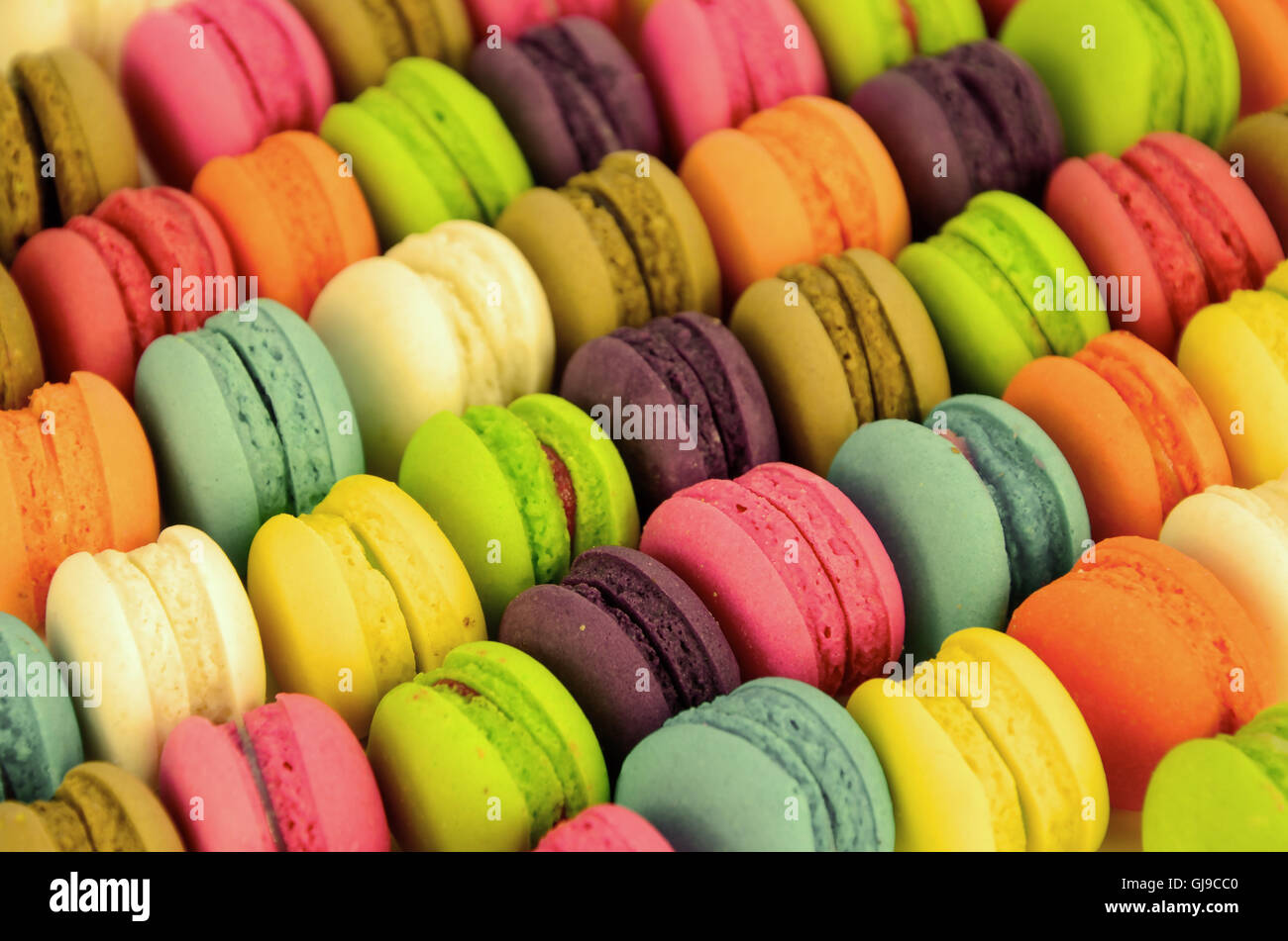 Macarons colorés réchauffement avec filtre de couleur. Banque D'Images