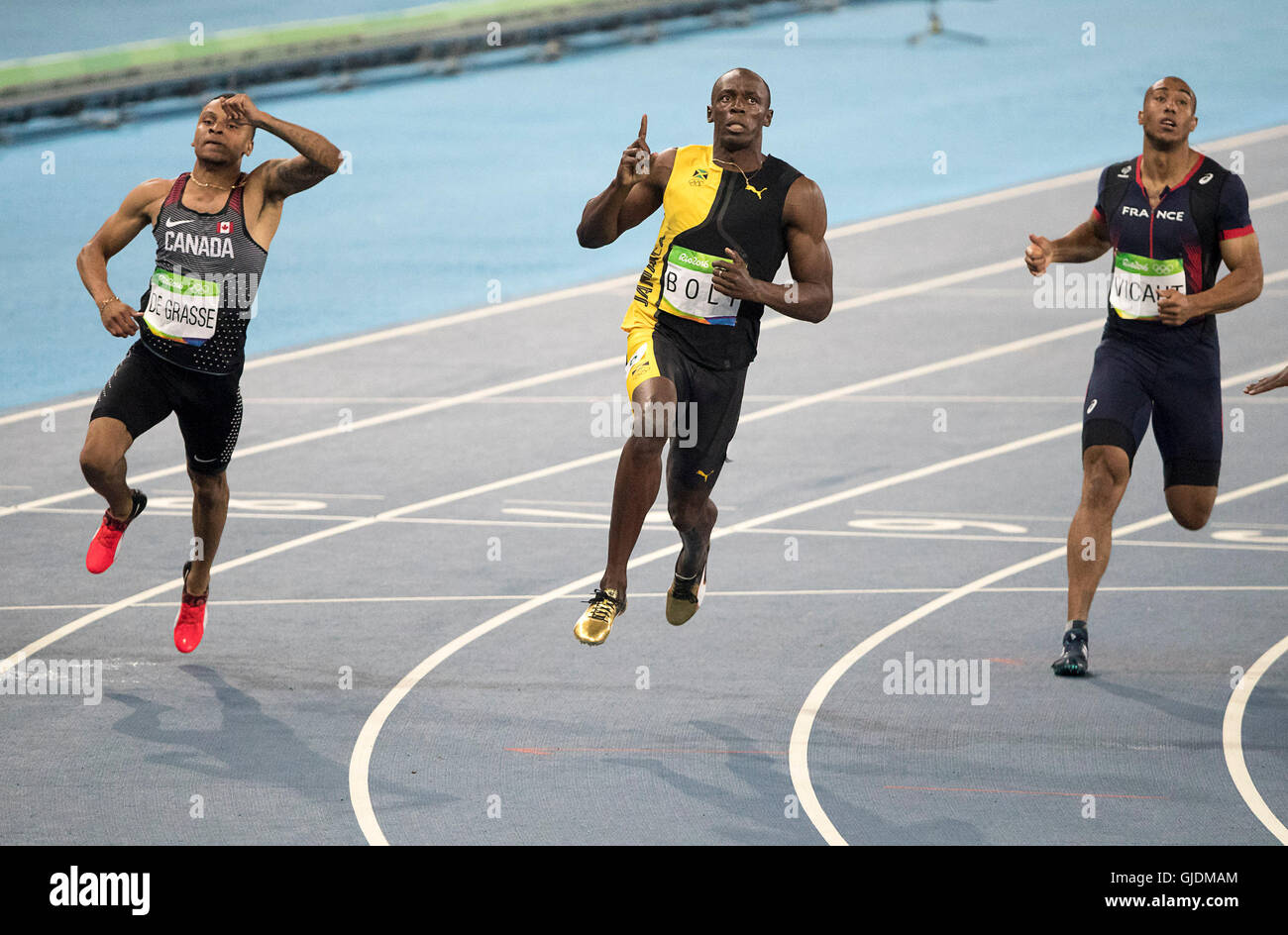 Rio de Janeiro, RJ, Brésil. 14Th Aug 2016. Athlétisme : Usain Bolt AUX JEUX OLYMPIQUES (JAM) courses pour une médaille d'or Médaille d'argent battu Justin Gatlin (USA) et médaillé de bronze André de Grasse (CAN) avec dans la finale du 100 m hommes au Stade olympique (EngenhÃ£o) au cours de l'été jeux olympiques de Rio 2016. Crédit : Paul Kitagaki Jr./ZUMA/Alamy Fil Live News Banque D'Images