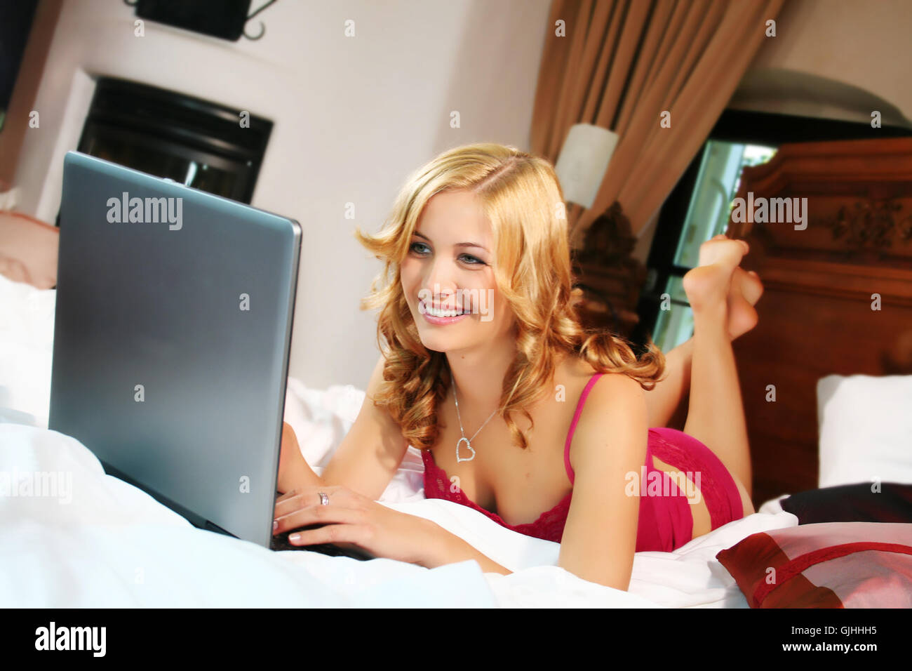 Woman in bed Banque D'Images