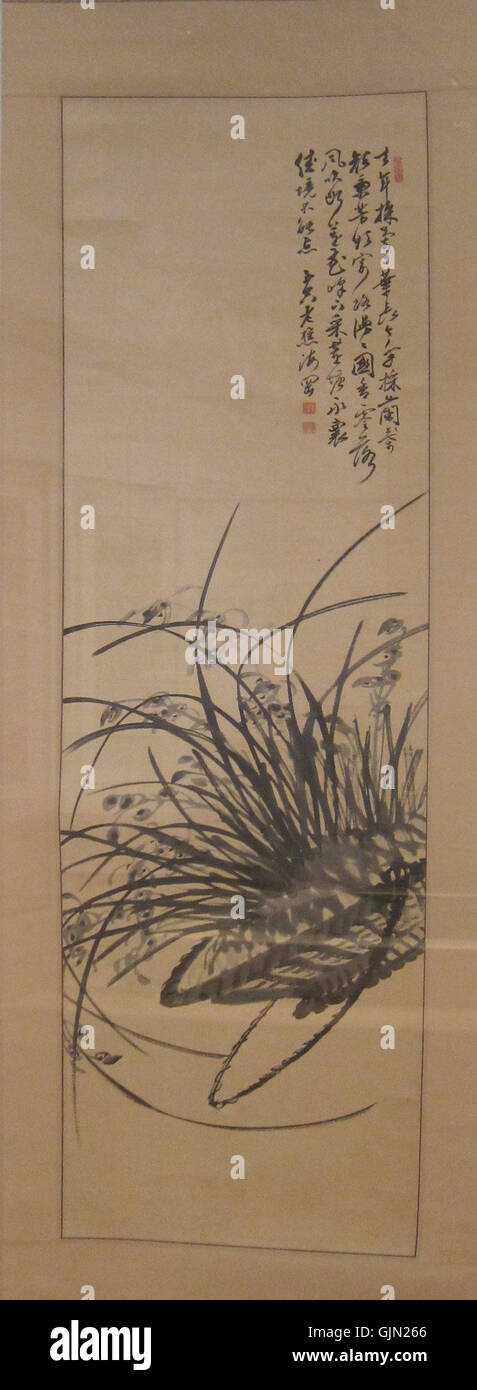 'Orchid in Hanging basket' est une encre sur papier de l'artiste Gim Gyu Jin, représentant une orchidée délicate dans un panier suspendu. La pièce met en valeur les traditionnelles botaniques asiatiques Banque D'Images