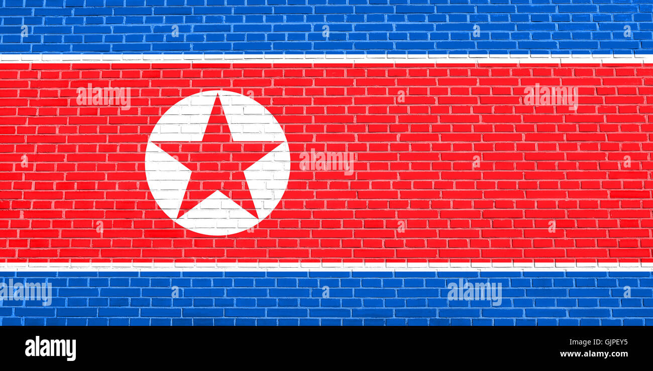 Drapeau de la Corée du Nord, République populaire démocratique de Corée sur mur de brique texture background. Corée, Corée du Nord, drapeau national. Banque D'Images