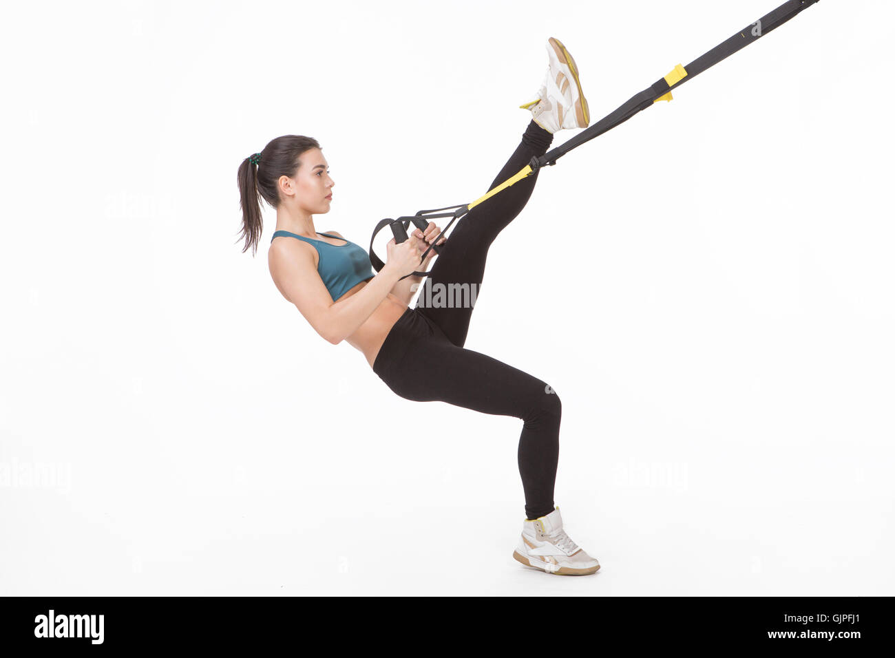 Formation Femme avec suspension trainer sling Banque D'Images