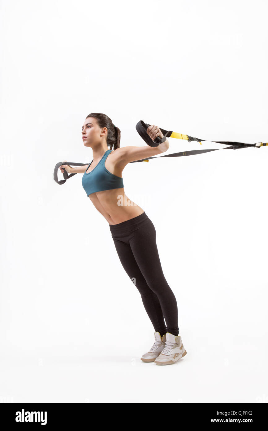 Formation Femme avec suspension trainer sling Banque D'Images