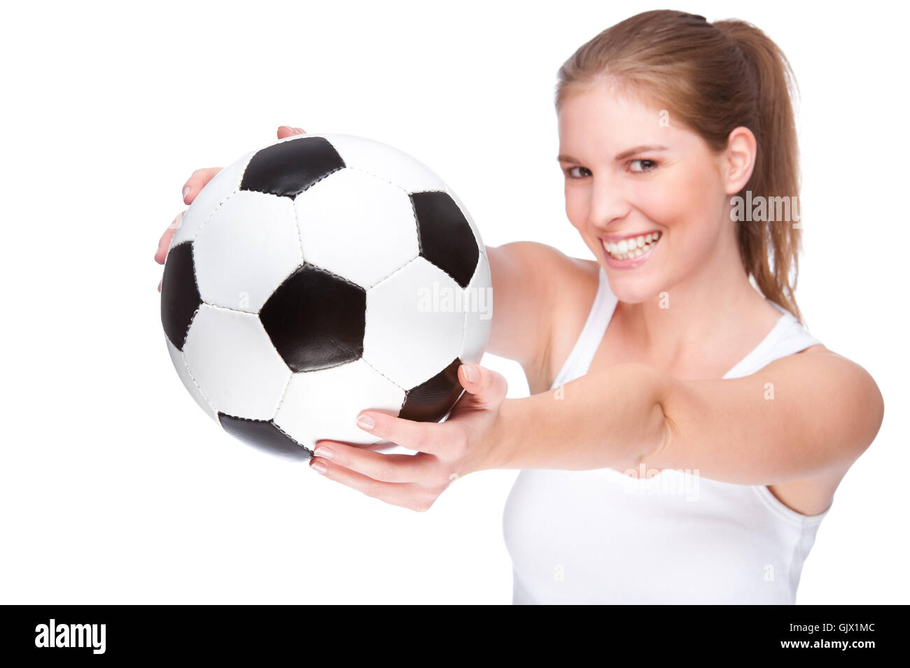 Femme avec un ballon de foot Photo Stock - Alamy