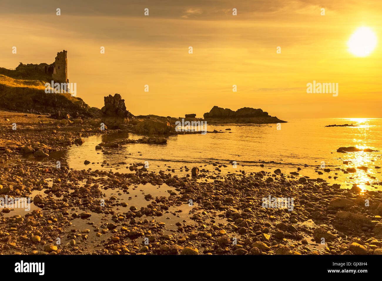 Coucher de soleil au château de Dunure, Ayrshire, Scotland, UK Banque D'Images