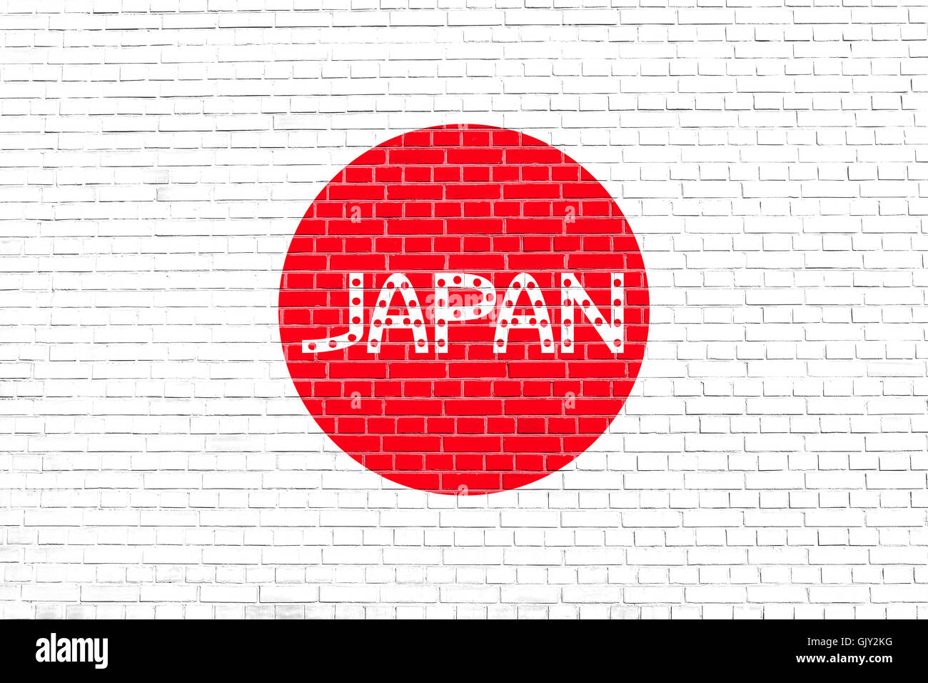 Pavillon du Japon sur mur de brique texture background. Drapeau national japonais. Mot du Japon. Banque D'Images