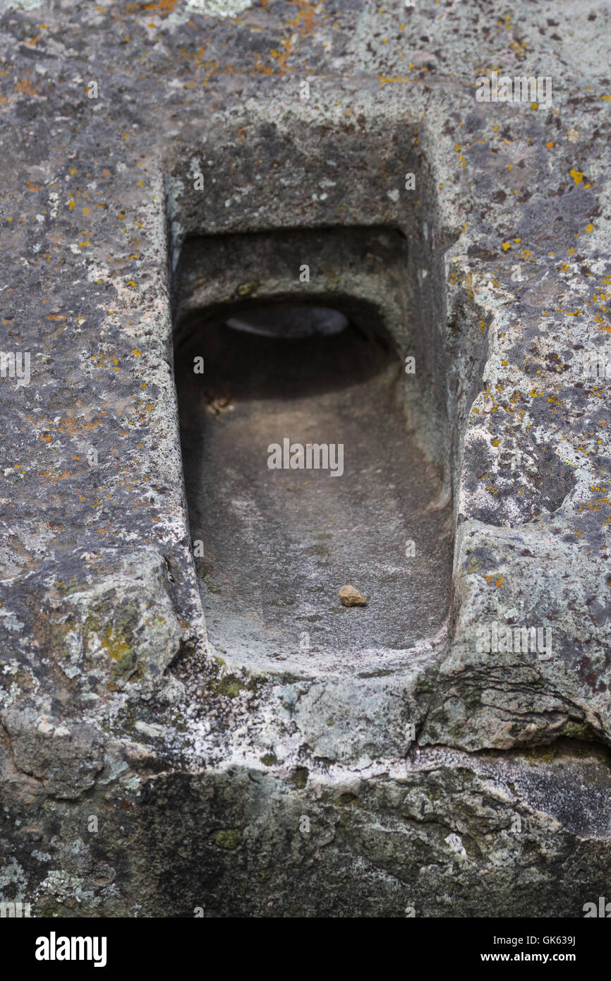 Close up d'un trou compliqué sur un rocher sans marques d'outils, de construction classique Inca Banque D'Images