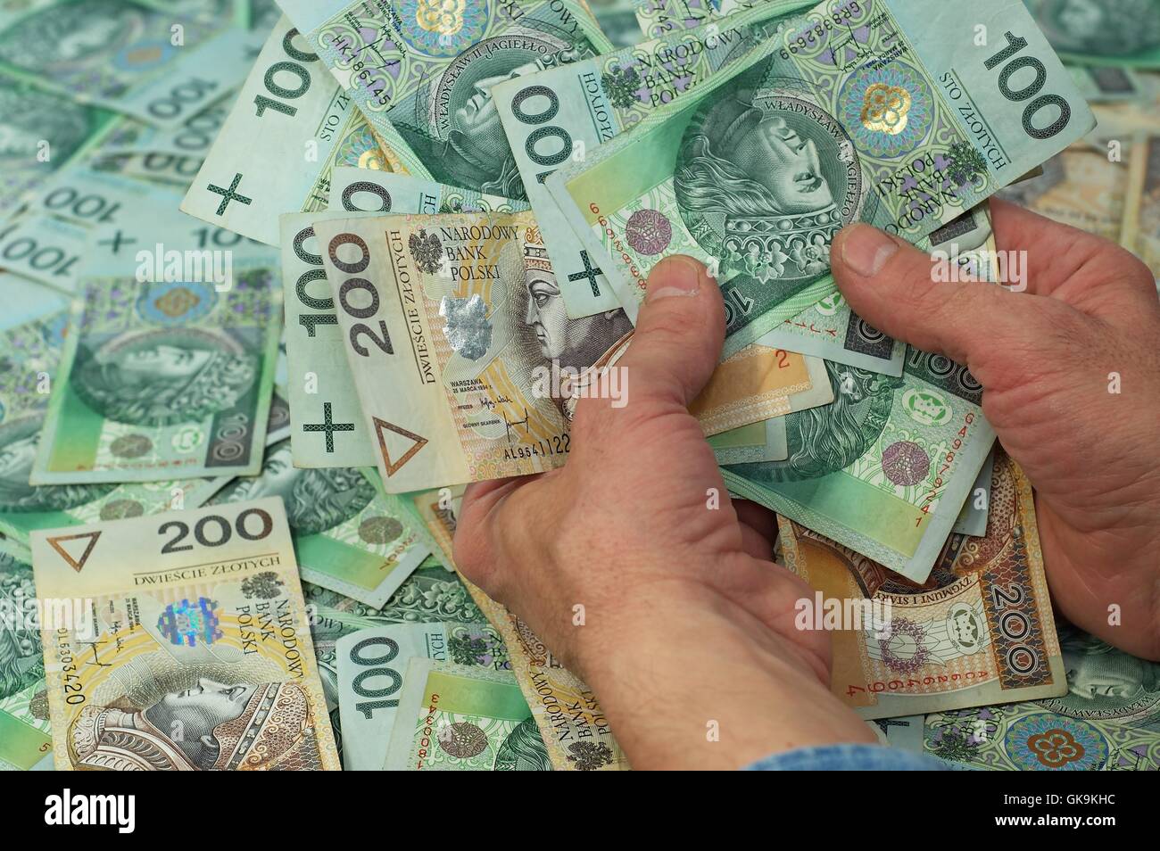 Pointeur main billets Banque D'Images