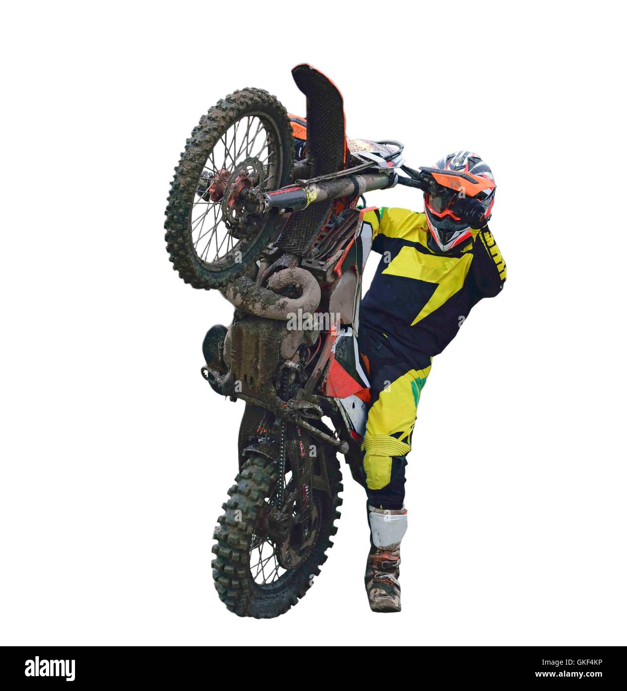 Rider sur motocross vélo sur la roue arrière est isolé sur fond blanc Photo  Stock - Alamy