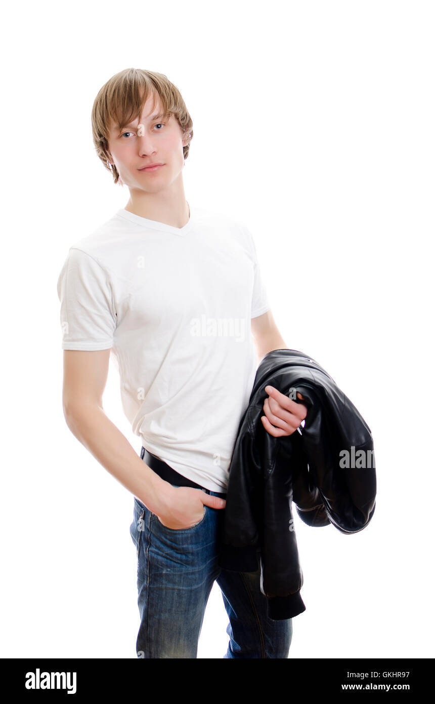 Casual young man en t-shirt blanc et veste en cuir dans les mains. Isolé sur blanc. Banque D'Images