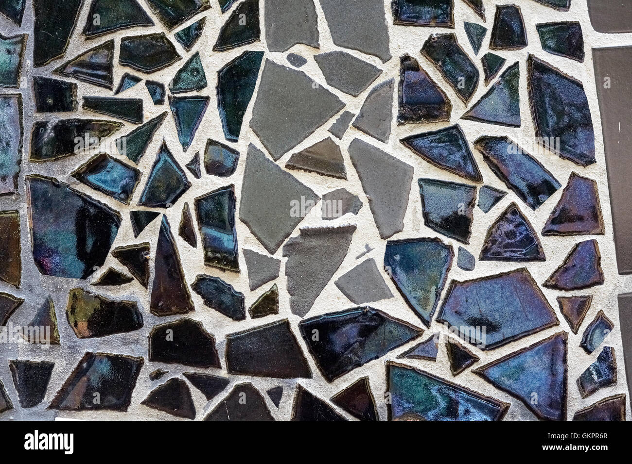 Carreaux de mosaïque mur sombre, texture abstrait ou l'arrière-plan. Banque D'Images